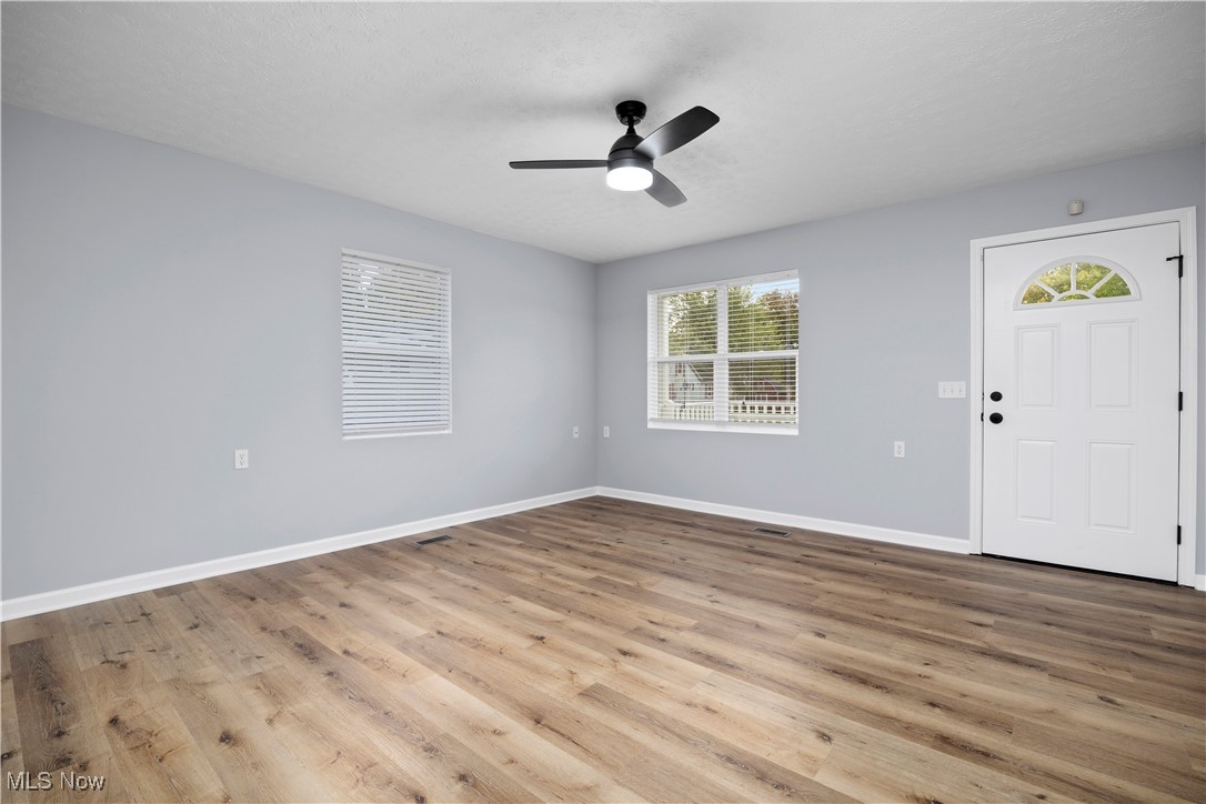 4341 Laurel Road Lorain, OH 44055 - Photo 8 of 36 Foyer entrance featuring hardwood / wood-style floors and ceiling fan