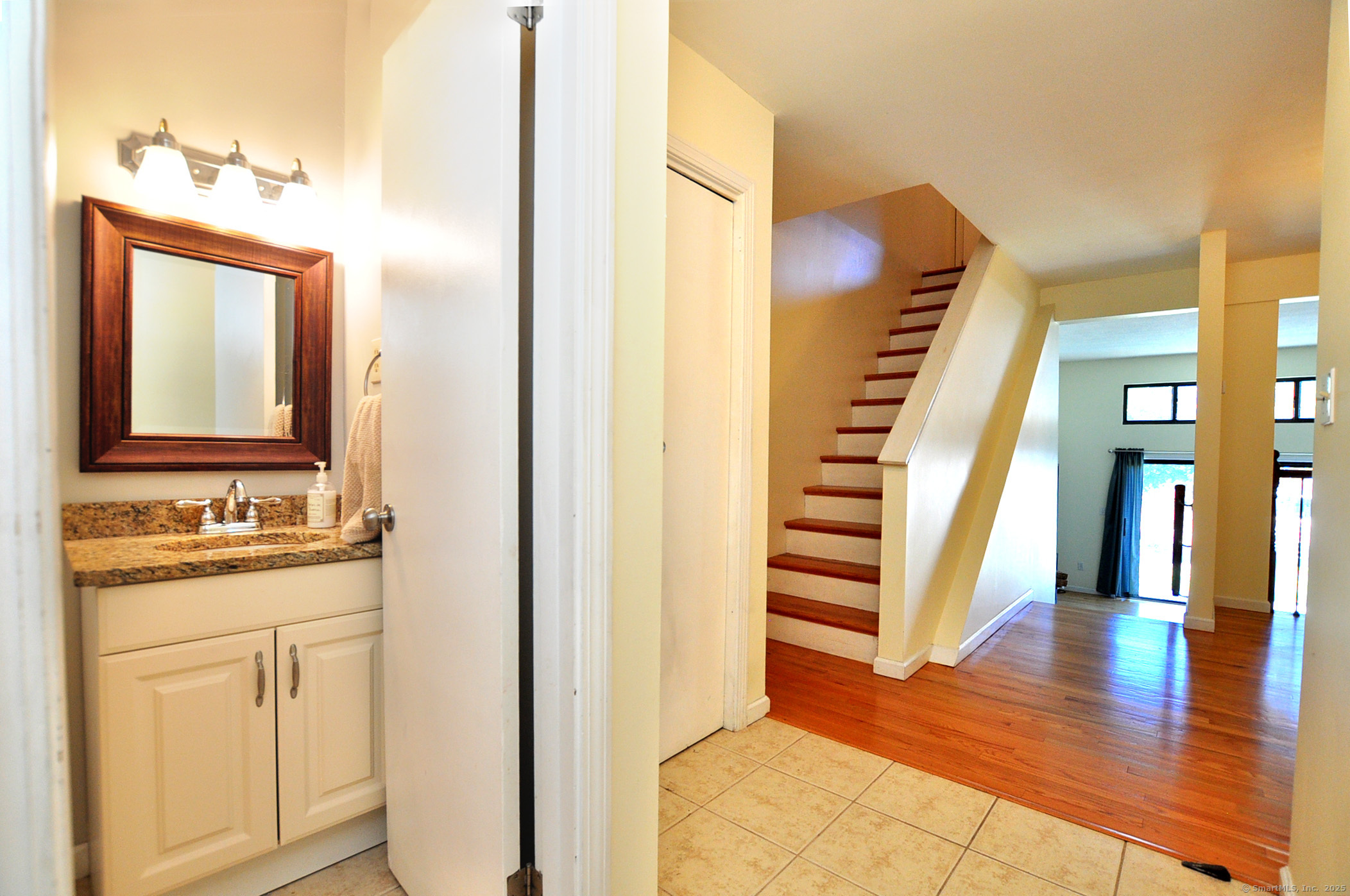 305 Timber Lane, Unit 305 Canton, CT 06019 - Photo 18 of 39 a bathroom with a sink and a mirror