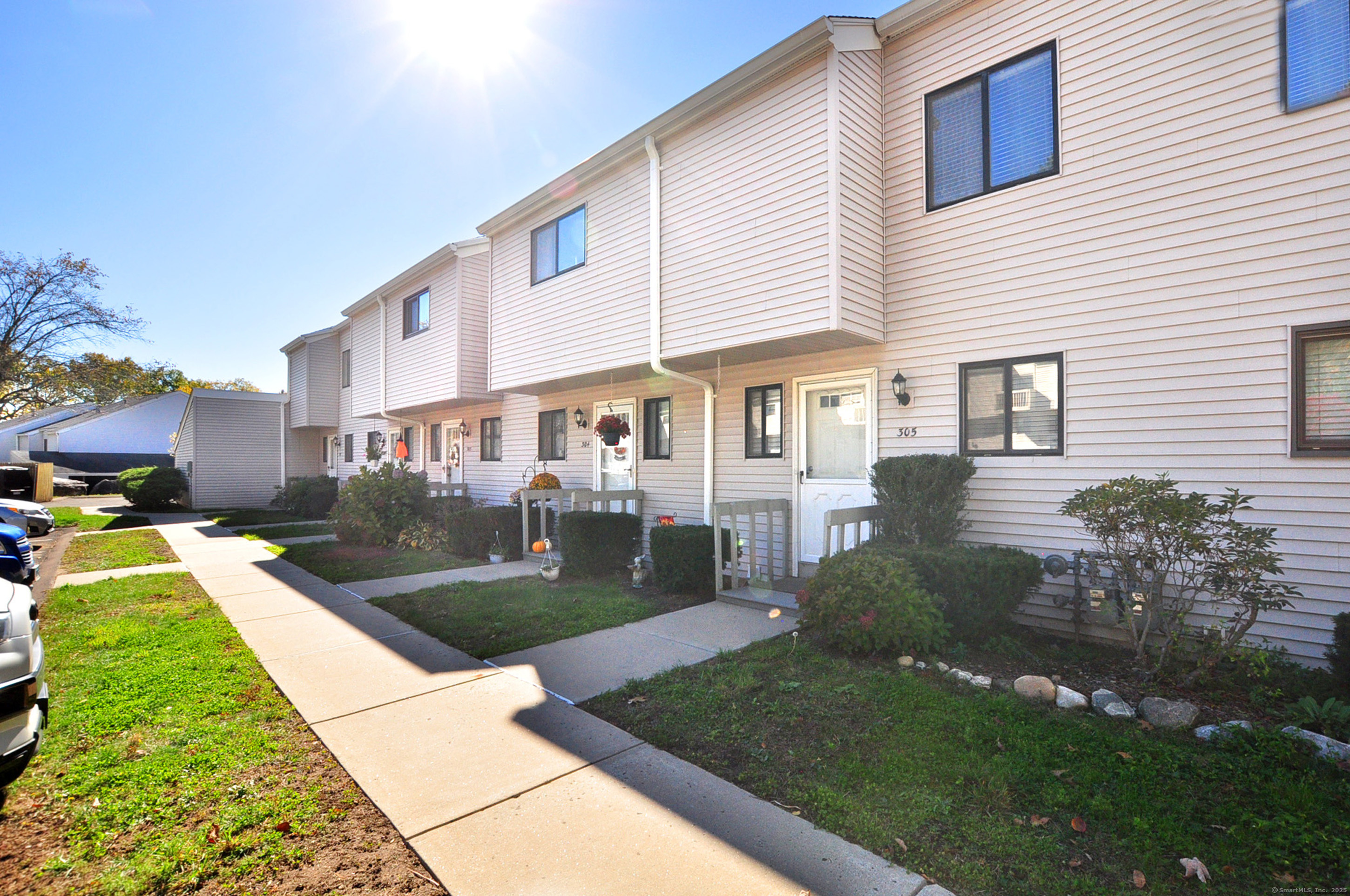 305 Timber Lane, Unit 305 Canton, CT 06019 - Photo 35 of 39 a view of a house with backyard