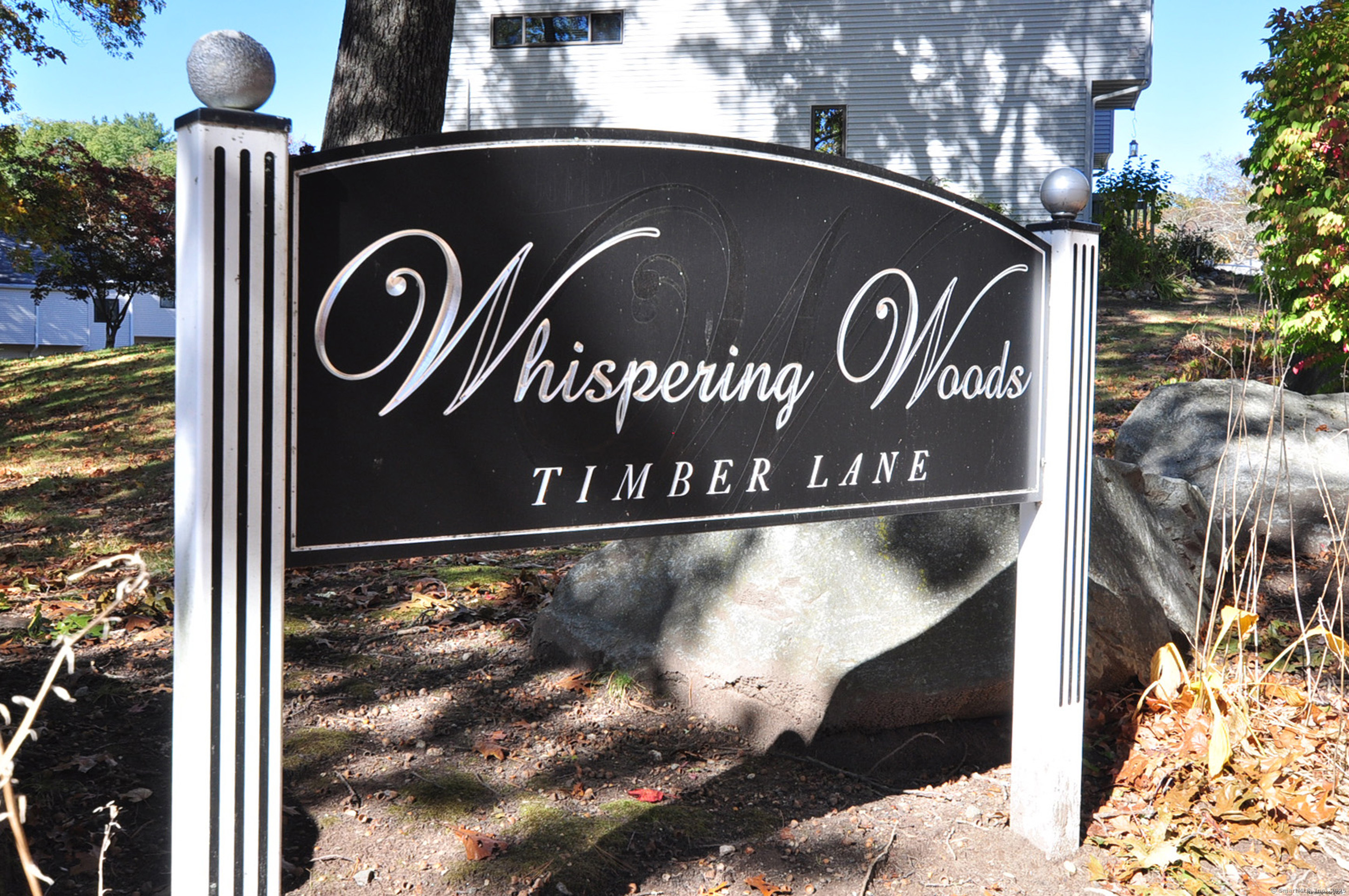 305 Timber Lane, Unit 305 Canton, CT 06019 - Photo 39 of 39 a close up of a street sign