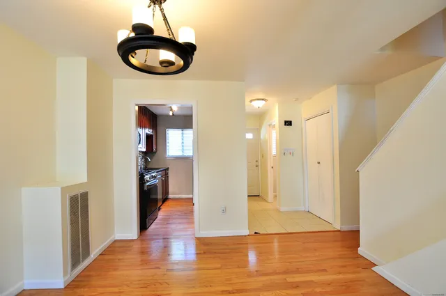 a view of livingroom with furniture and wooden floor