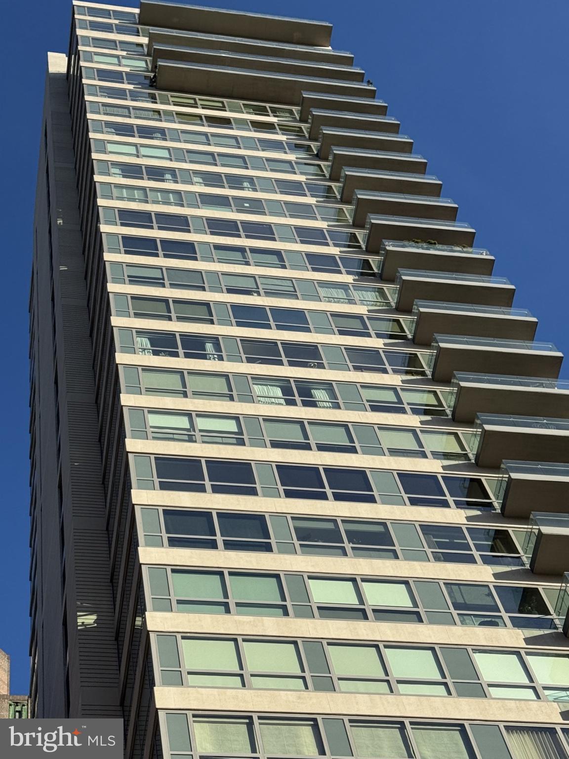a view of a building from a backyard
