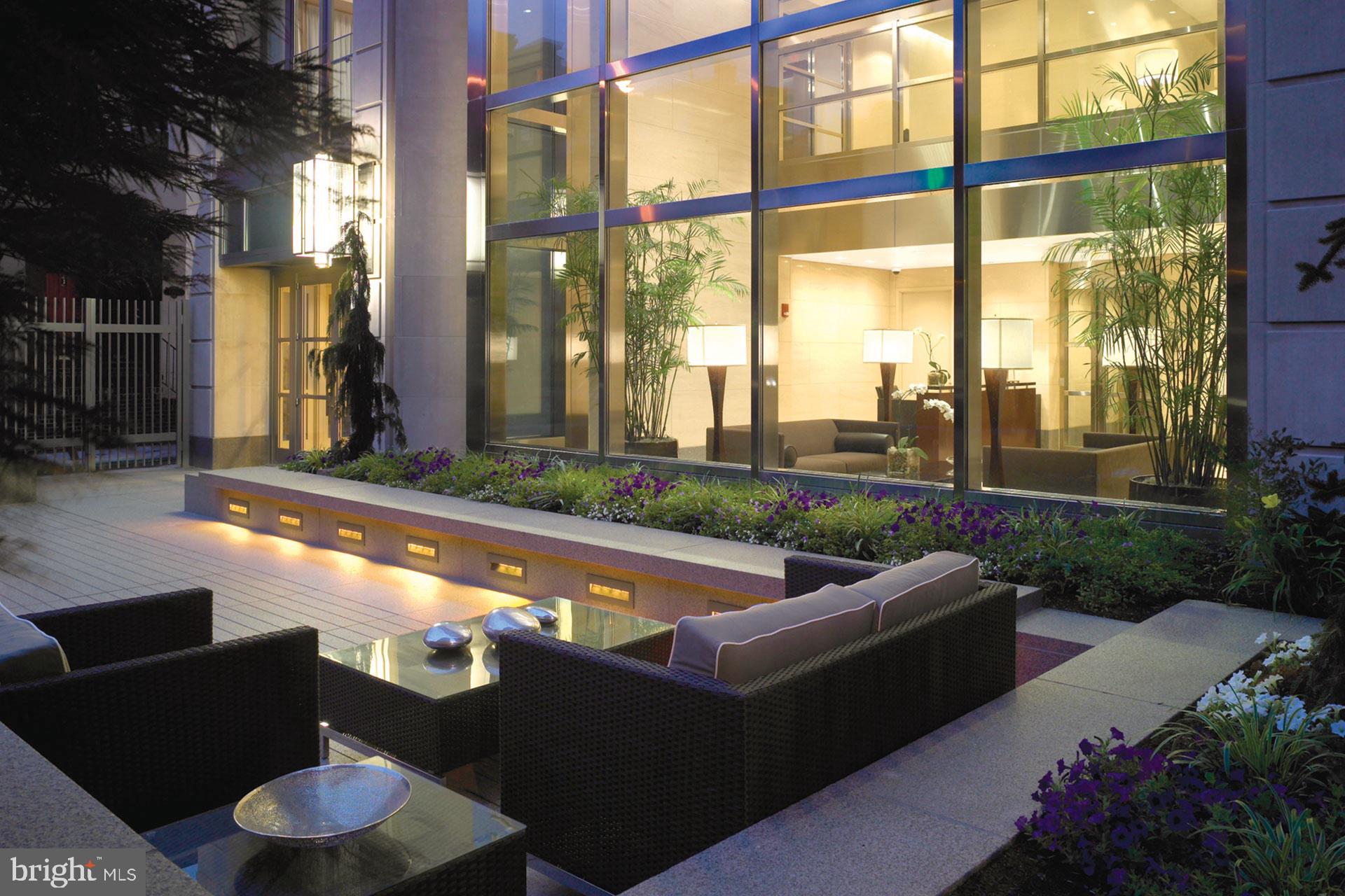 1706 Rittenhouse Square, Unit 2201 Philadelphia, PA 19103 - Photo 2 of 4 a view of a patio with couches and pool