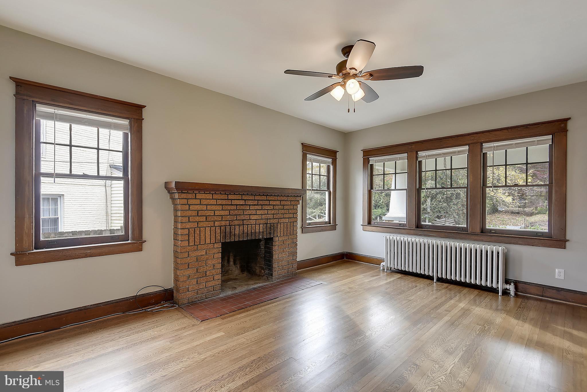 7211 Blair Road Northwest Washington, DC 20012 - Photo 14 of 53 Living Room with Wood Burning Fireplace