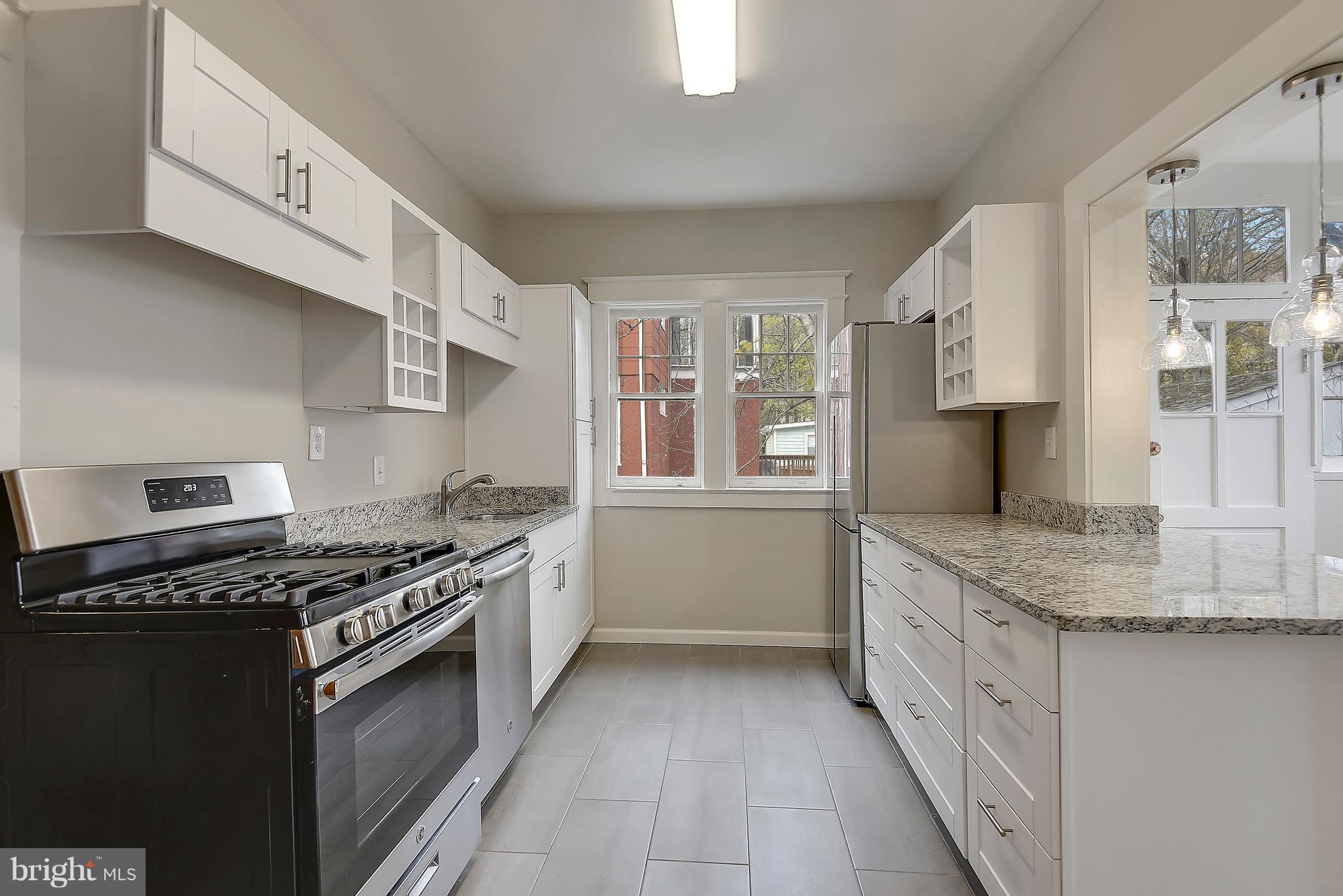 7211 Blair Road Northwest Washington, DC 20012 - Photo 8 of 53 White Shaker Cabinets & Granite Countertops