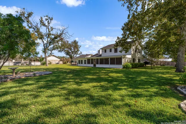 a view of a house with a big yard