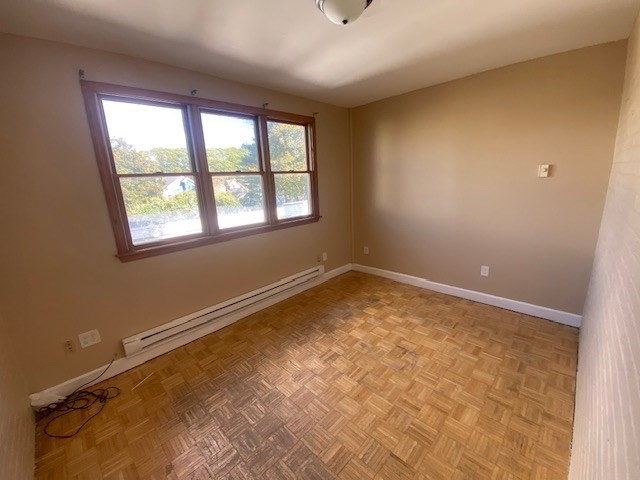 123 Glendower Road, Unit 1 Boston, MA 02131 - Photo 11 of 11 a view of a room with a window
