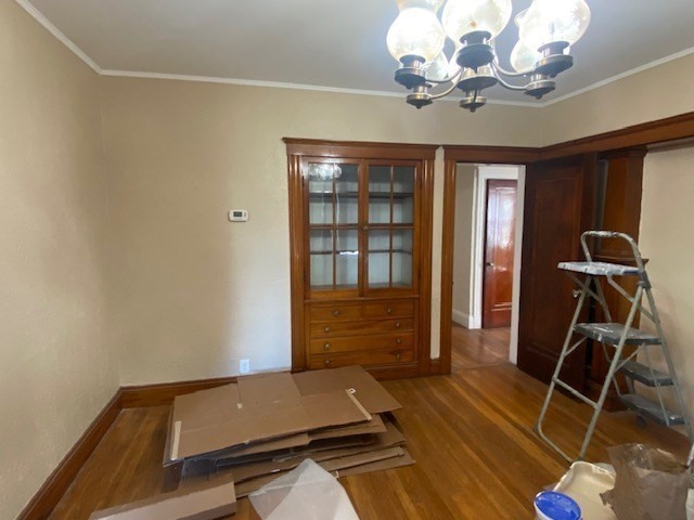 123 Glendower Road, Unit 1 Boston, MA 02131 - Photo 7 of 11 a room with gym equipment