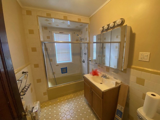 123 Glendower Road, Unit 1 Boston, MA 02131 - Photo 10 of 11 a bathroom with a tub sink and mirror