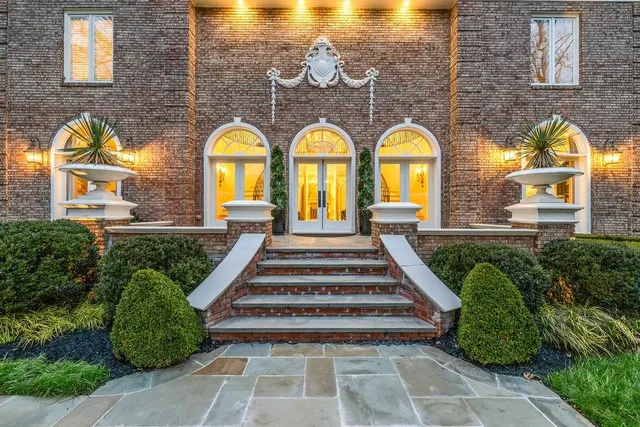 a view of entryway livingroom and hall way with wooden floor