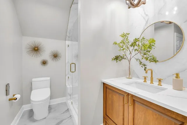 a view of a patio with dining table and chairs with wooden floor