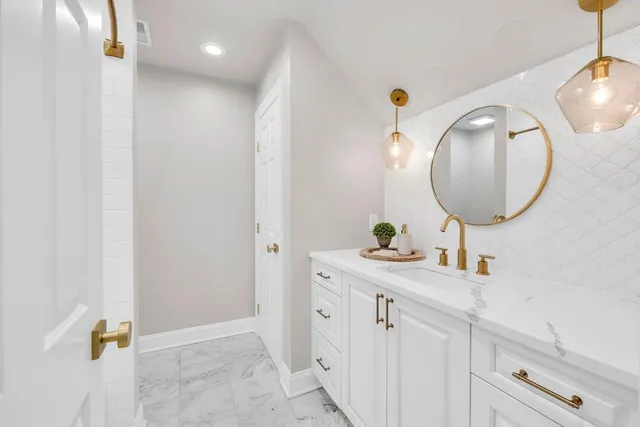 a view of a house with backyard sitting area and swimming pool