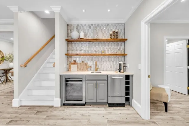 a bathroom with a shower and a sink