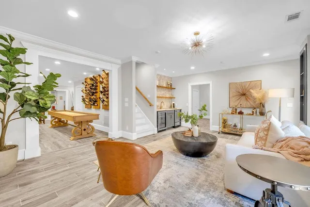 a white toilet sitting next to a bathroom