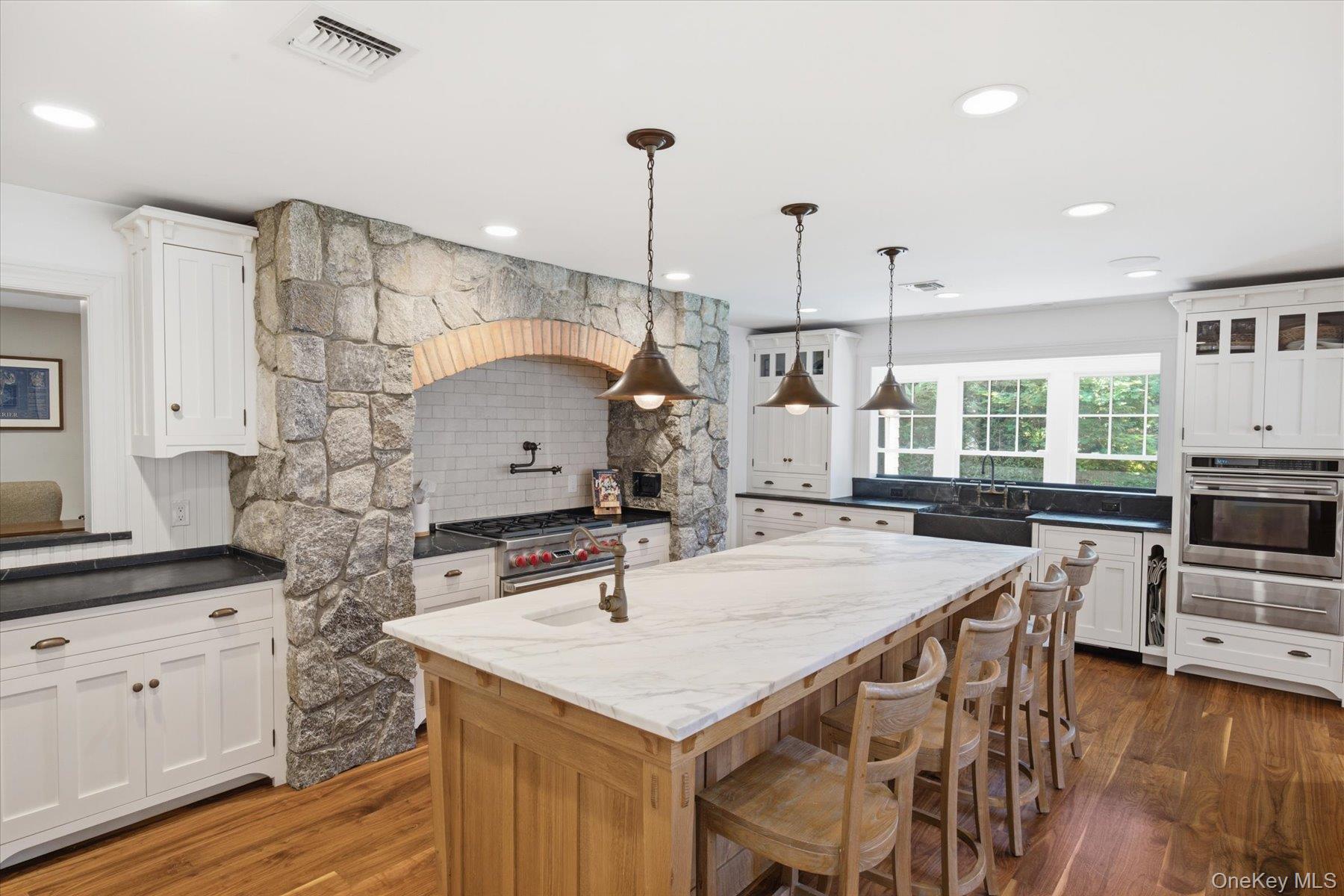 134 Sandy Hollow Road Northport, NY 11768 - Photo 4 of 28 Custom Crown Point Cabinetry throughout kitchen