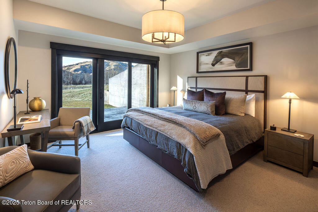 14135 Drake Drive Jackson, WY 83001 - Photo 23 of 35 Lower Level Guest Bedroom
