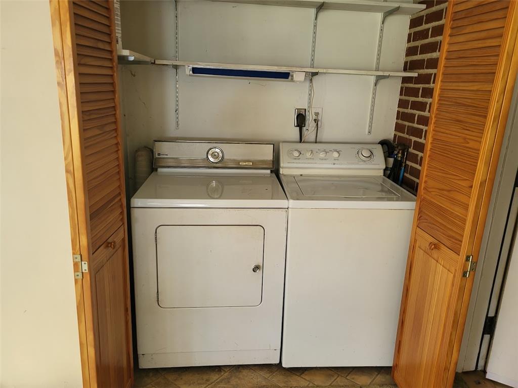 3134 Roxford Road Allentown, PA 18103 - Photo 32 of 34 A dedicated utility space with washer and dryer units, neatly tucked away behind louvered doors.