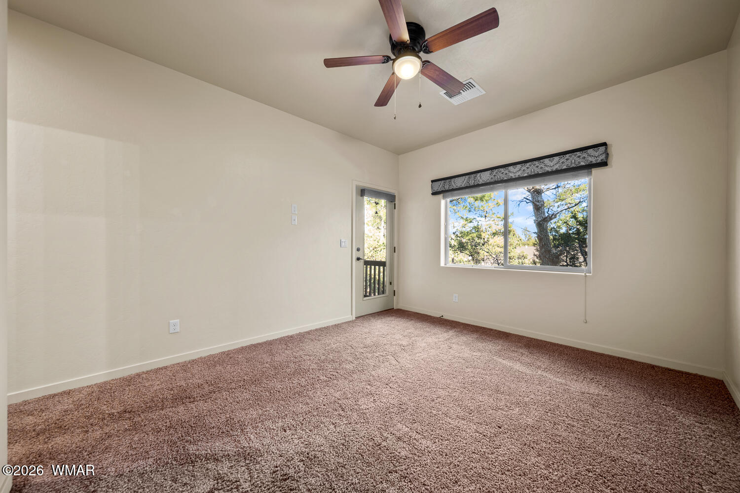 5859 Apollo Way Lakeside, AZ 85929 - Photo 15 of 35 a view of an empty room with a window