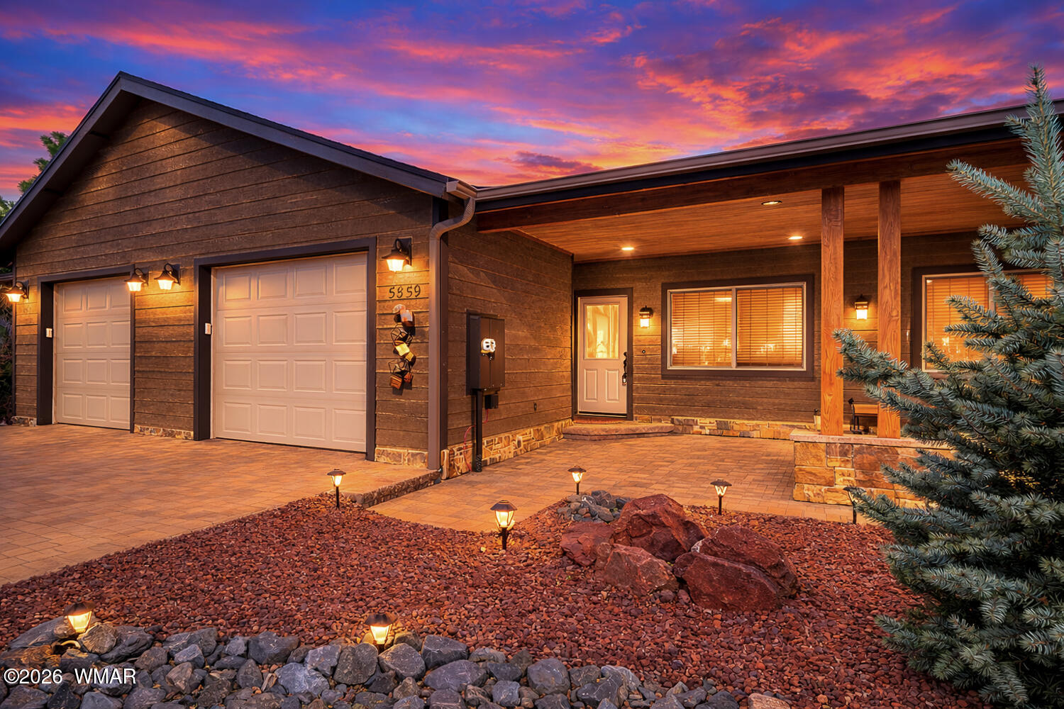 5859 Apollo Way Lakeside, AZ 85929 - Photo 2 of 35 a view of a house with a porch