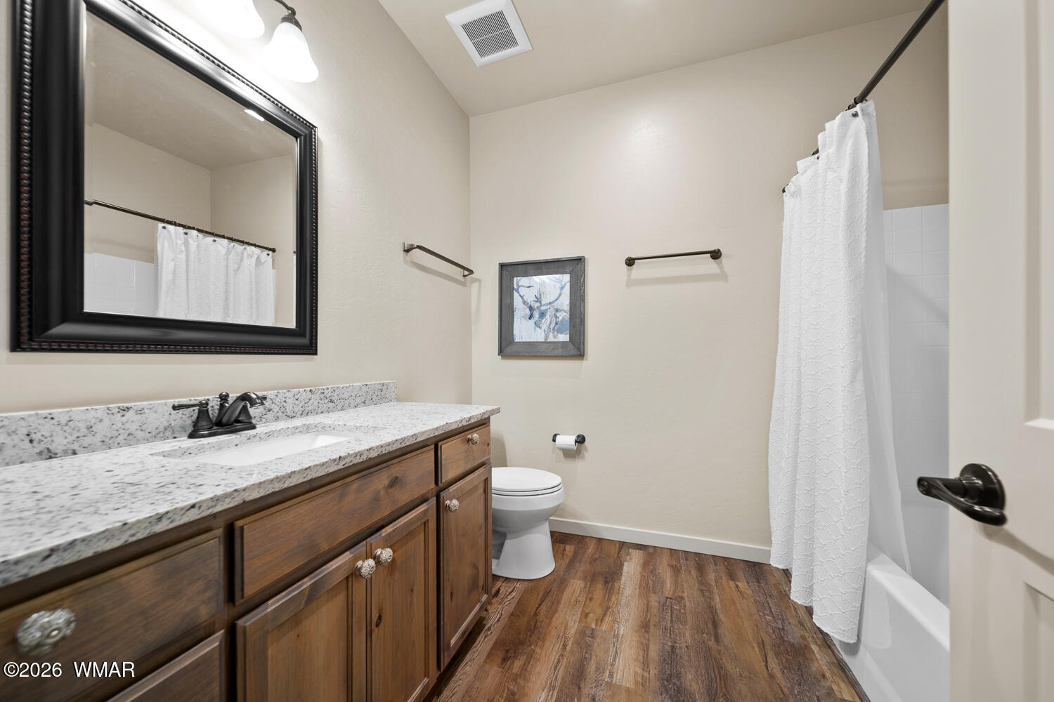 5859 Apollo Way Lakeside, AZ 85929 - Photo 22 of 35 a bathroom with a granite countertop sink toilet and shower