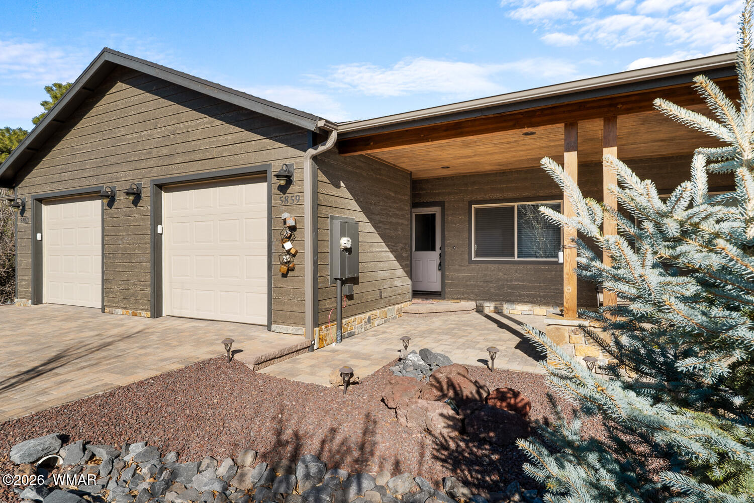 5859 Apollo Way Lakeside, AZ 85929 - Photo 27 of 35 a front view of a house with a yard