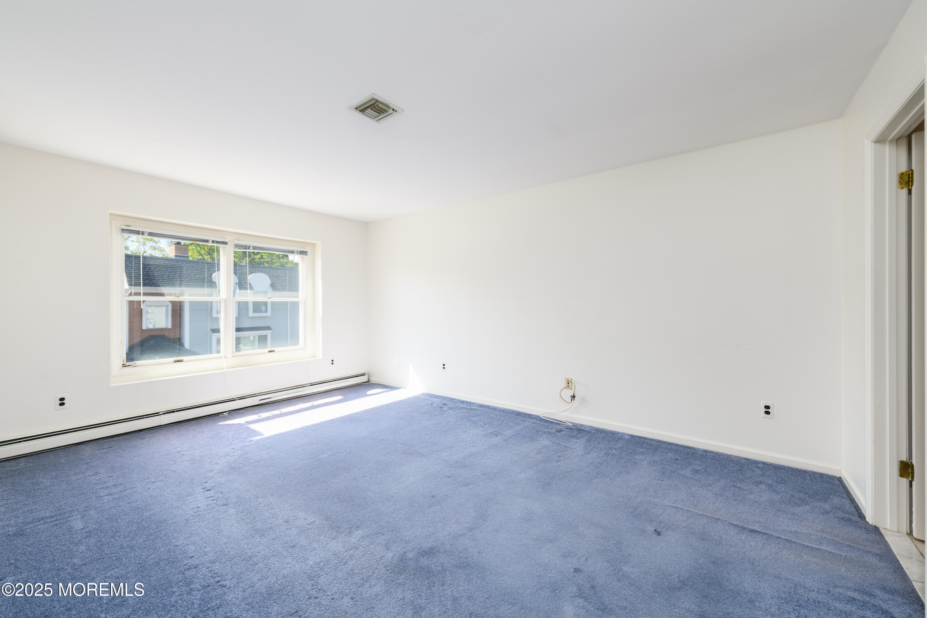 65 East River Road, Unit 14 Rumson, NJ 07760 - Photo 16 of 22 an empty room with a window