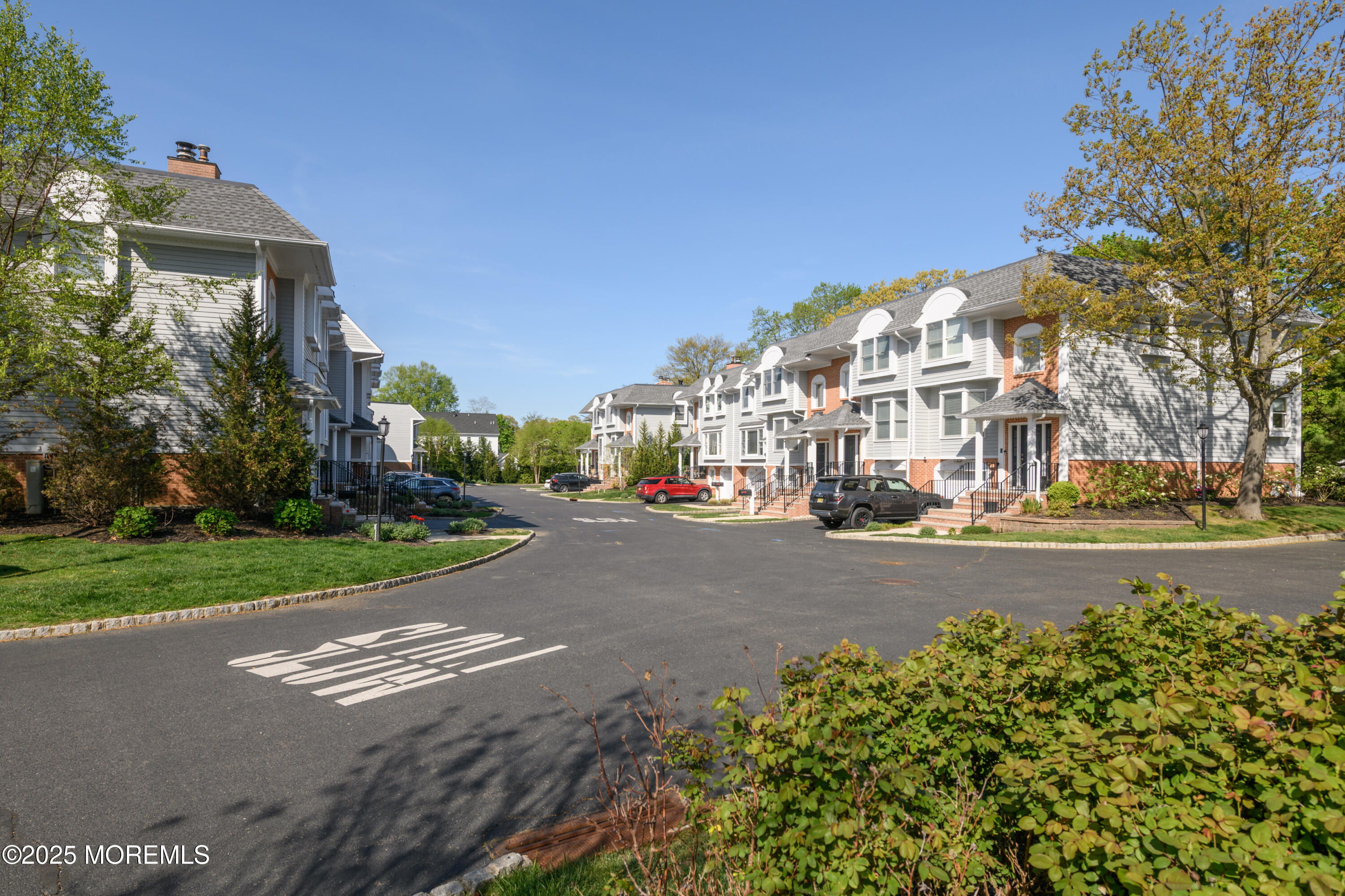 65 East River Road, Unit 14 Rumson, NJ 07760 - Photo 2 of 22 a view of city with tall buildings