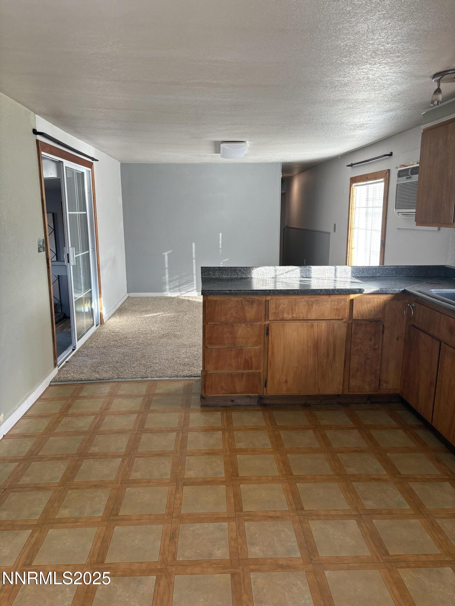 20 Miley Lane Yerington, NV 89447 - Photo 11 of 29 a spacious bathroom with a vanity a mirror and bathtub