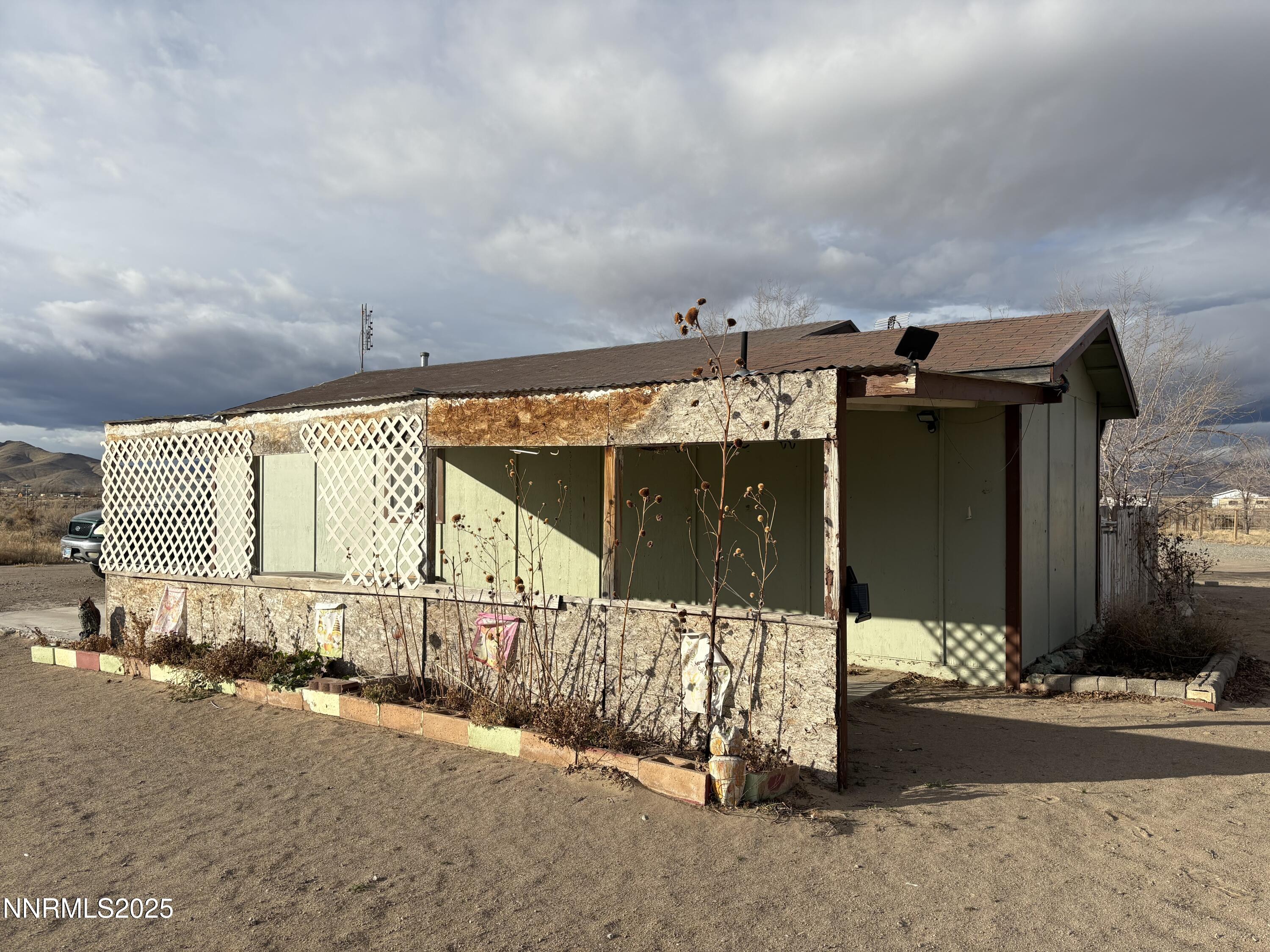 20 Miley Lane Yerington, NV 89447 - Photo 24 of 29 an outdoor view of a building