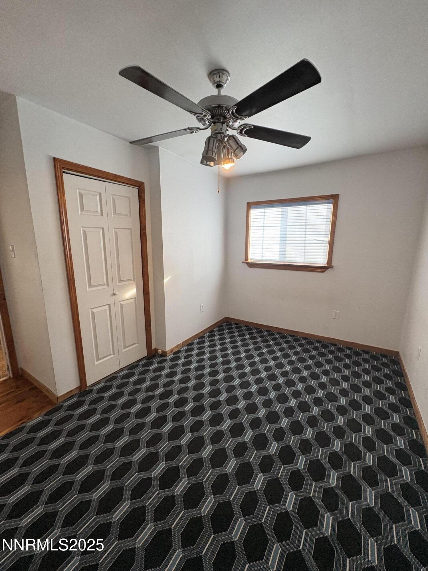 20 Miley Lane Yerington, NV 89447 - Photo 9 of 29 a black and white checkered floor