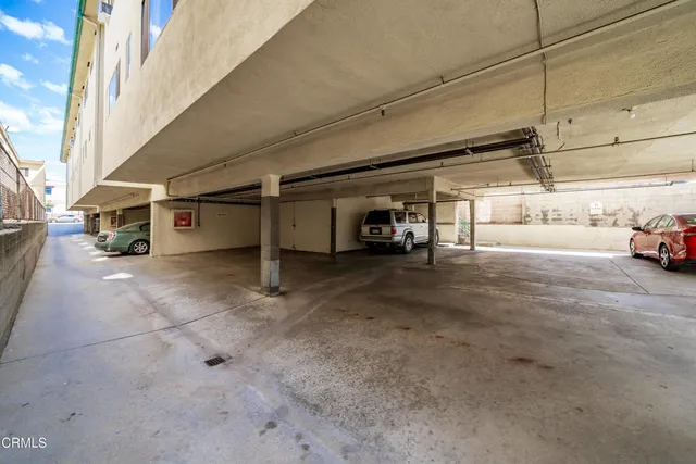 a view of balcony with wooden floor and a potted plant