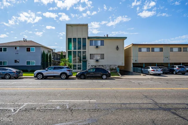 a car parked in front of a house