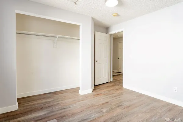 a bathroom with a sink toilet vanity and bathtub