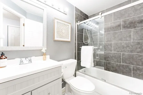 an empty room with a empty space and windows