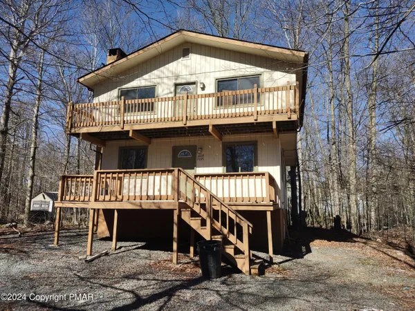 a front view of a house with a balcony
