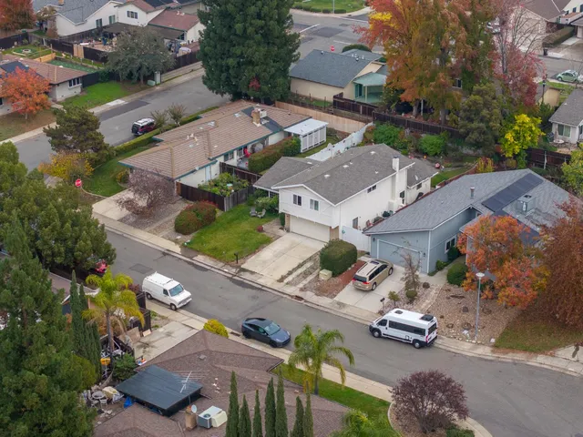 an aerial view of a city with lots of residential buildings