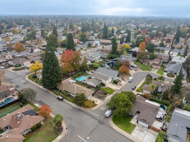 an aerial view of a house with a garden