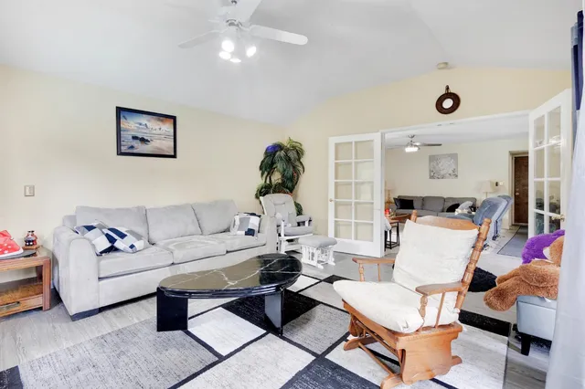 a room with furniture and wooden floor