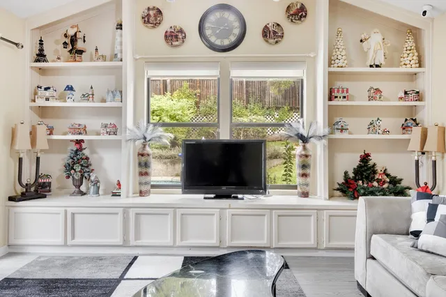 a kitchen with stainless steel appliances granite countertop sink stove top oven and cabinets