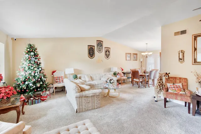 a living room with furniture and a couch