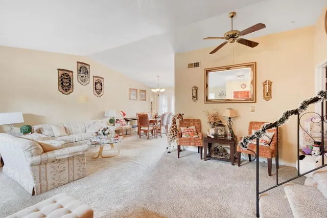 a kitchen with granite countertop a stove and cabinets