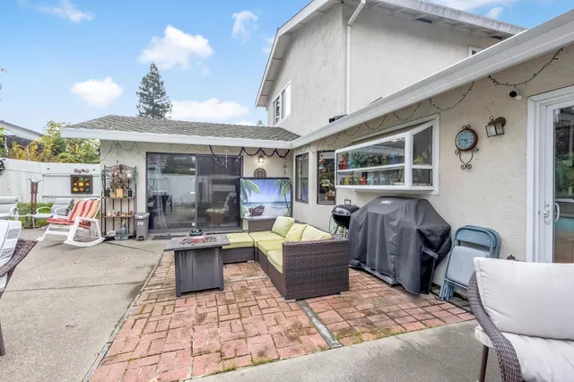 an aerial view of a house with a garden