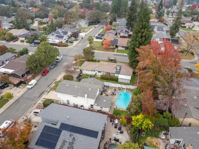 an aerial view of a house with a garden
