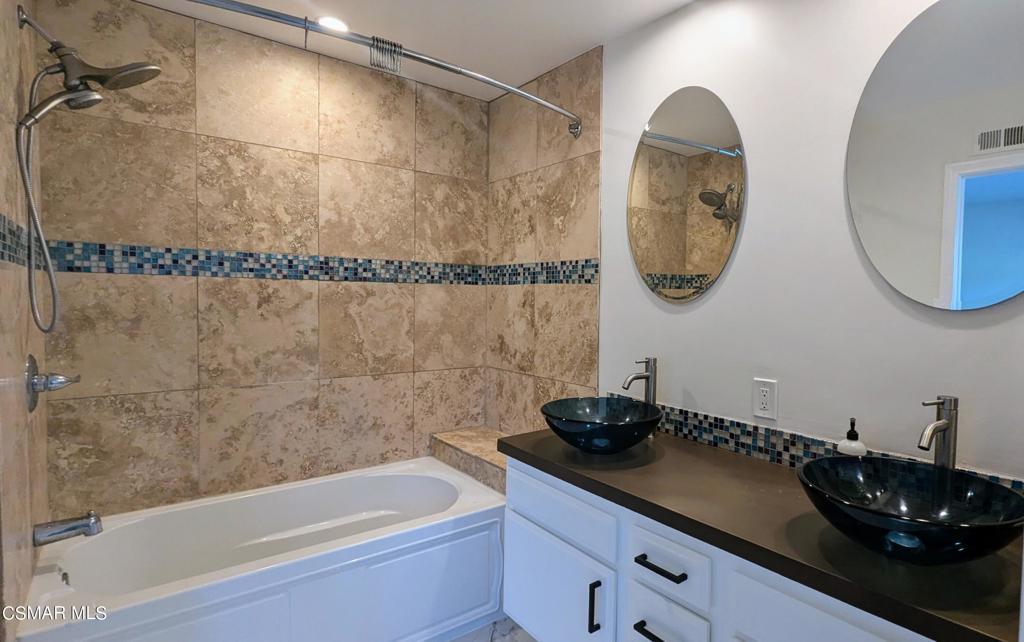 2501 Radford Court Simi Valley, CA 93063 - Photo 11 of 21 a bathroom with a sink and a mirror