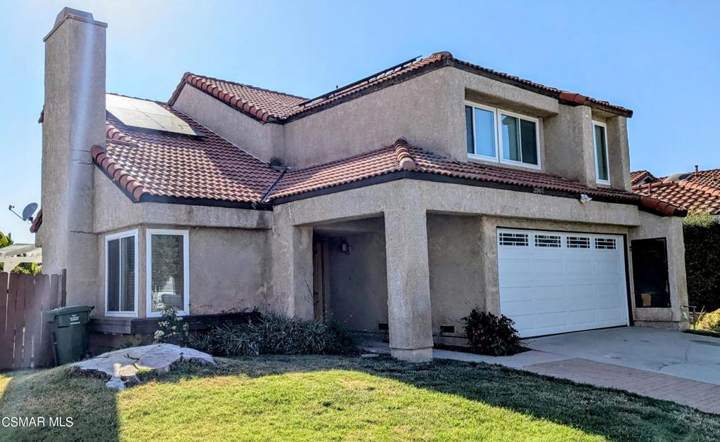 2501 Radford Court Simi Valley, CA 93063 - Photo 2 of 21 a front view of a house with a yard
