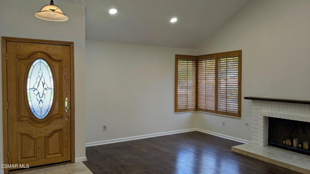 2501 Radford Court Simi Valley, CA 93063 - Photo 3 of 21 a view of a livingroom with wooden floor and a large window