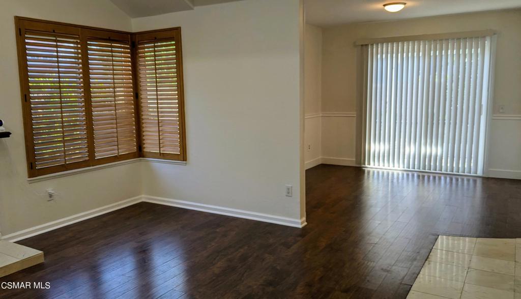 2501 Radford Court Simi Valley, CA 93063 - Photo 6 of 21 wooden floor in an empty room with a window
