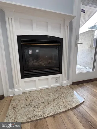 a living room with a fireplace