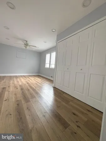 a view of a livingroom with wooden floor