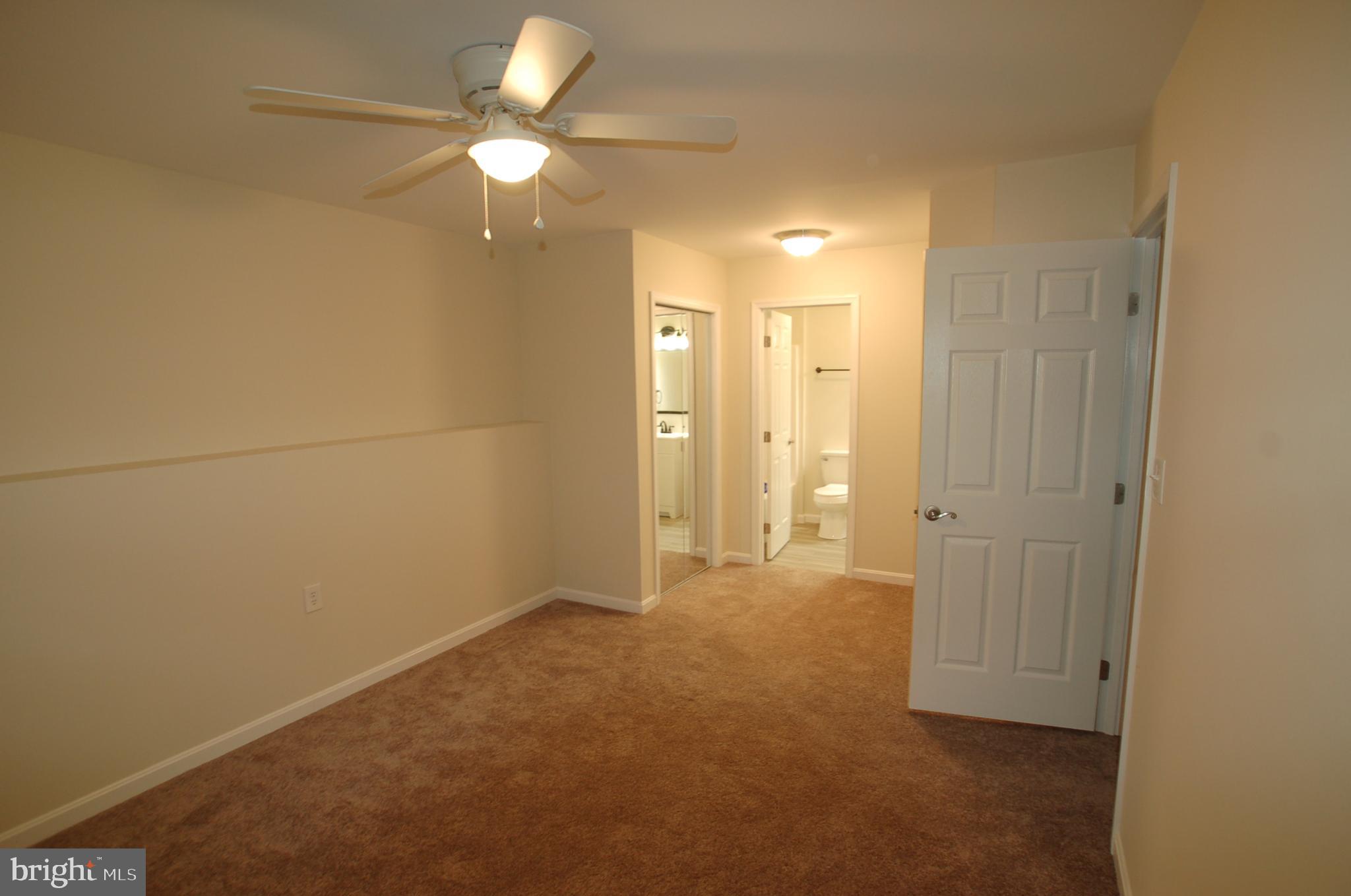 8275 Sycamore Road Lusby, MD 20657 - Photo 12 of 19 Bedroom 4 on lower level - 10'5" x 12'